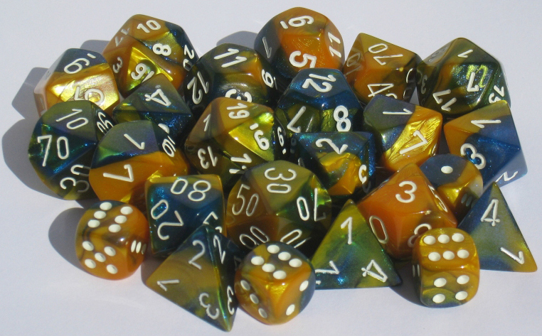 Chessex (26460): Polyhedral 7-Die Set: Gemini: Masquerade-Yellow/White 