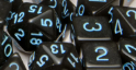 Role 4 Initiative: Polyhedral 15 Dice Set: Translucent Black with Light Blue Numbers Arch D4 